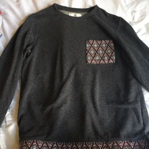 On the Byas sweatshirt